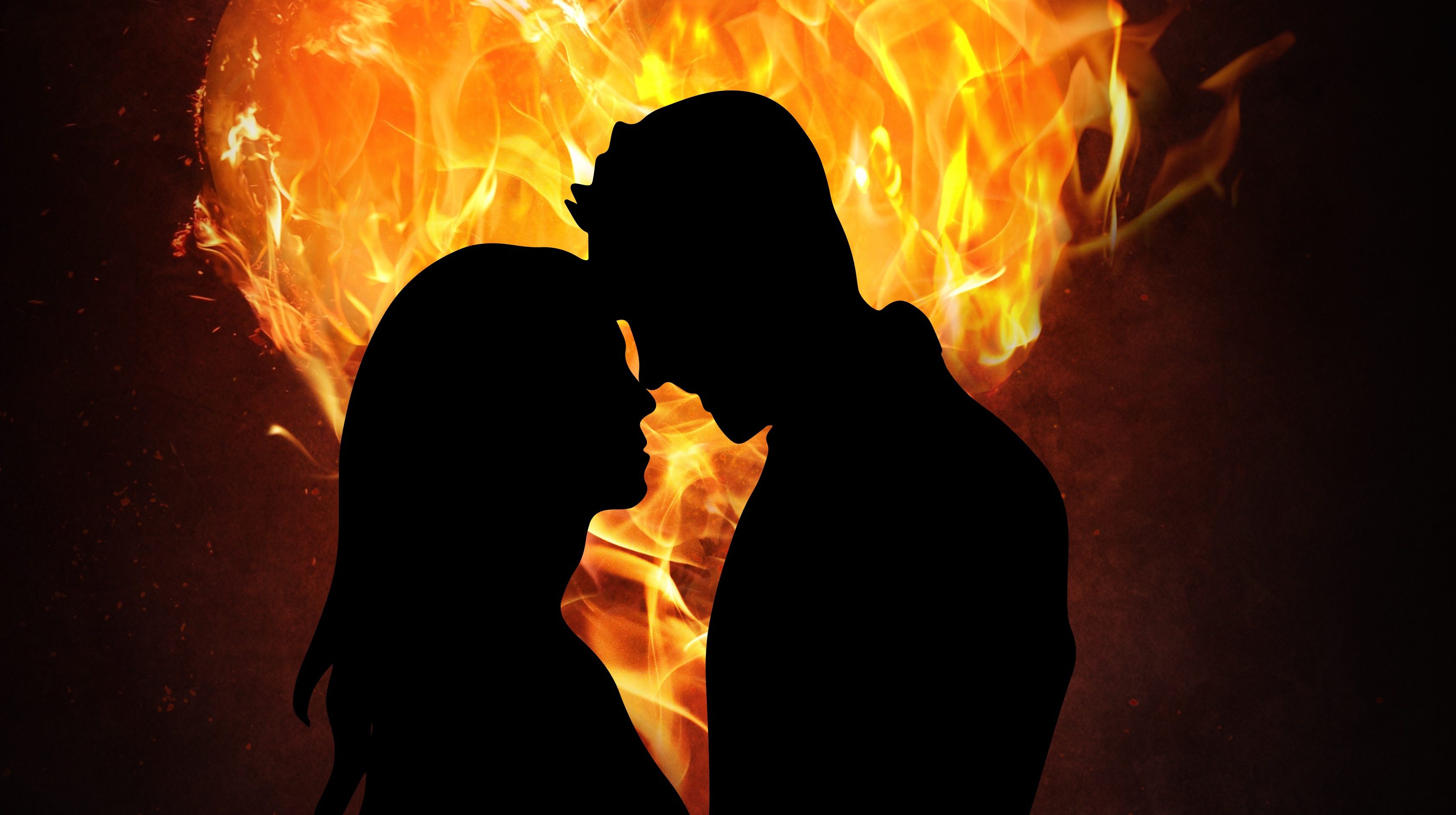 Пожары любви холидей. Страсть огонь любовь. Огненный поцелуй. Огни любви. Мужчина и женщина в огне.